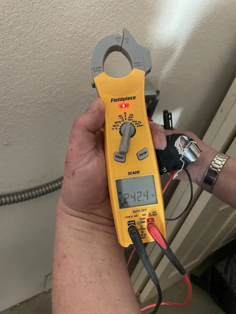 Voltage testing with clamp meter during Circuit Breaker Repair in Bean Station